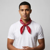 Man wearing a red bandana and white t-shirt against a gray background